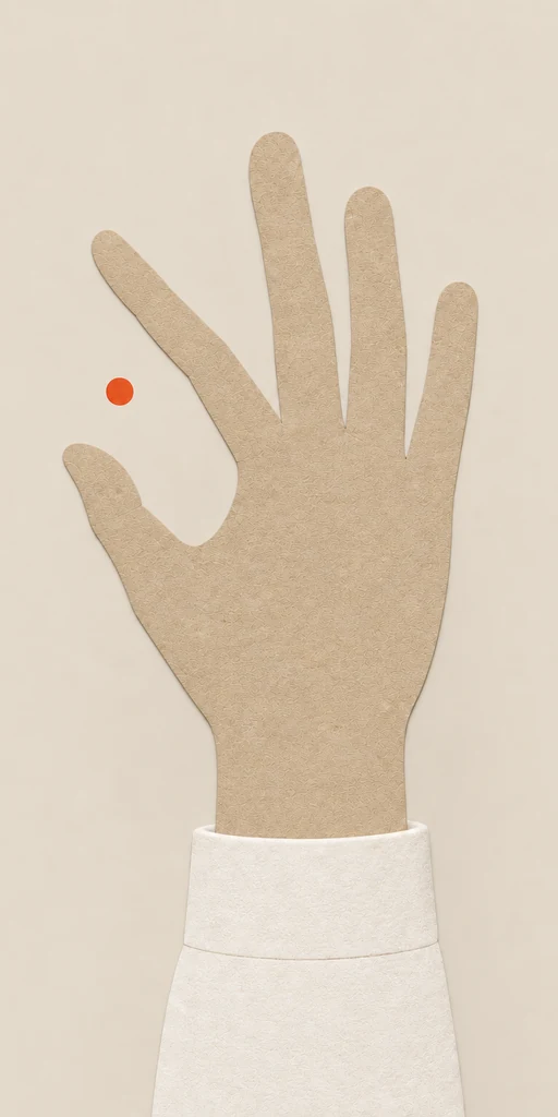 A hand with the thumb and index finger held wide apart.